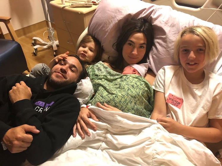 An Instagram post with Pete Wentz and Meagan Camper with their newborn and their other two children ...