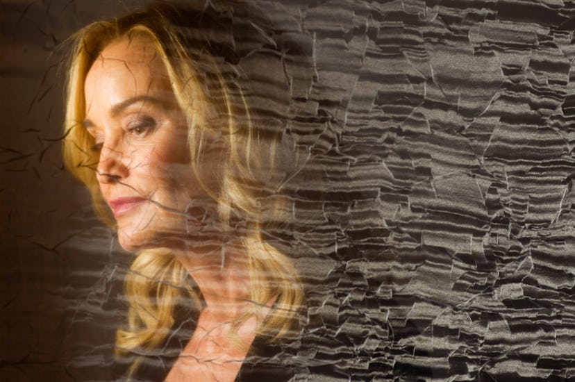 Actress Jessica Lange, photographed through a cracked veil, sits for a portrait at the Four Season