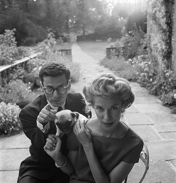 Richard Avedon next to his wife Evelyn Franklin, and a dog photographed by Cecil Beaton