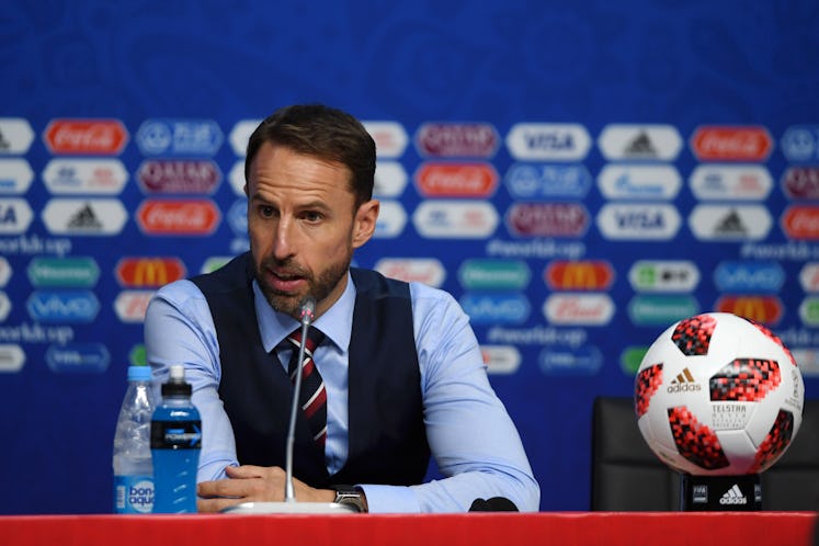 Gareth Southgate in a black waistcoat at the press conference after the Sweden v England Quarter Fin...