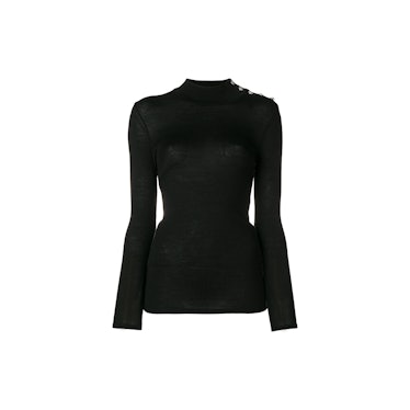 A black Balmain knit with brass button sweater