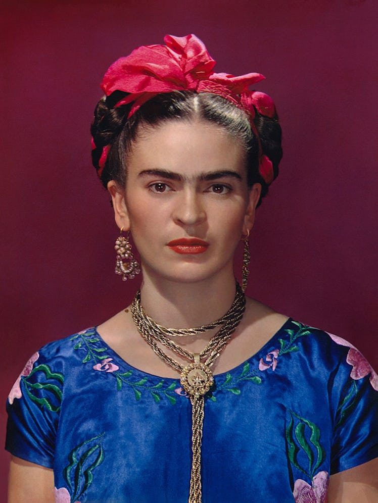 Frida Kahlo in blue satin blouse, 1939. Photograph Nickolas Muray © Nickolas Muray Photo Archives.jp...