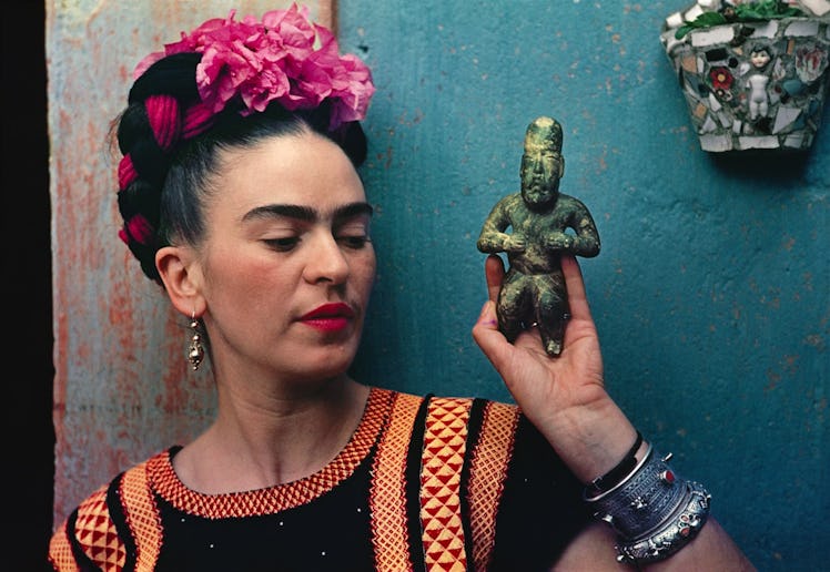 Frida Kahlo with Olmec figurine, 1939. Photograph Nickolas Muray. © Nickolas Muray Photo Archives.jp...