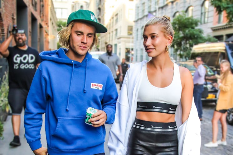 Justin and Hailey Bieber walking down the street in the New York City