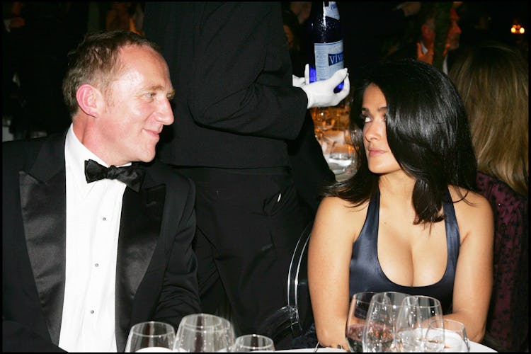 Salma Hayek and François-Henri Pinault looking at each other.