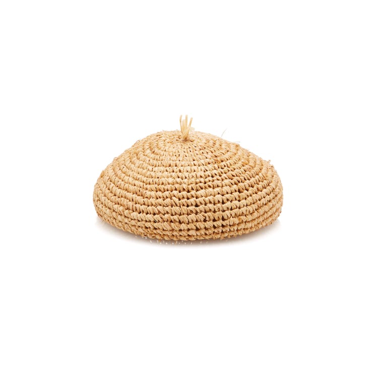 A natural straw beret by Gigi Burris