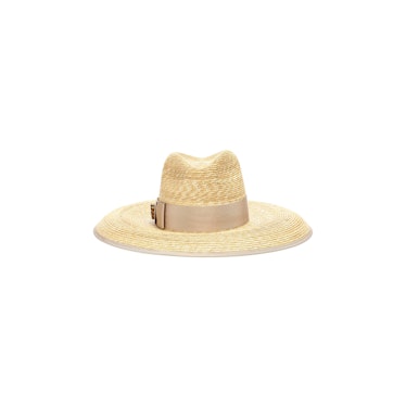 A natural straw hat with a beige fabric detail by Gucci