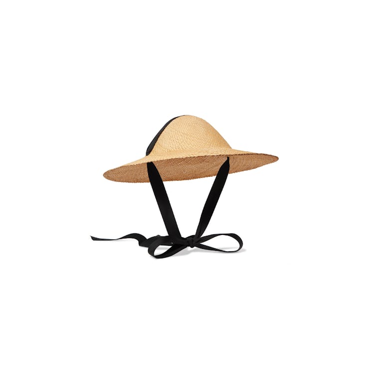 A natural straw hat with a black tie ribbon by Clyde