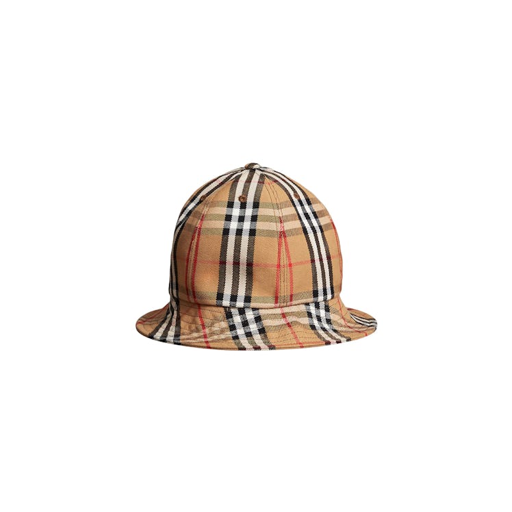 A bucket hat in beige with black-white and red checked pattern by Burberry