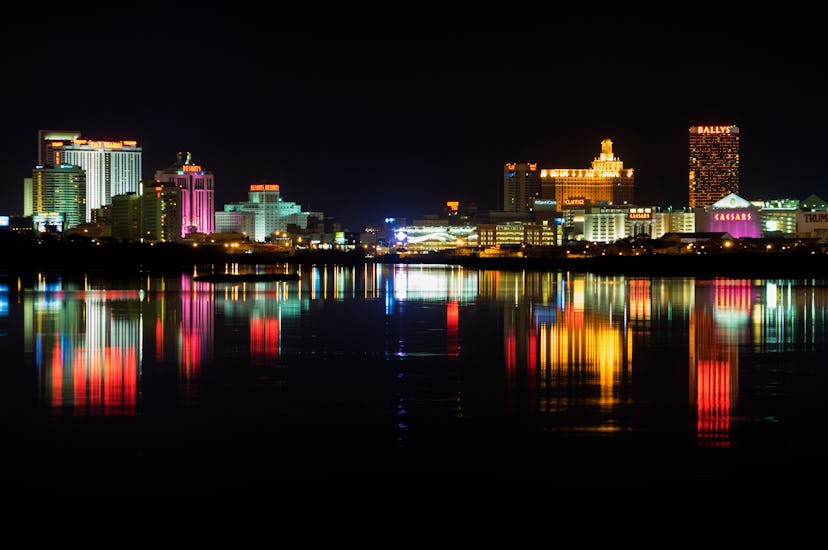 Atlantic City skyline reflected on the water.