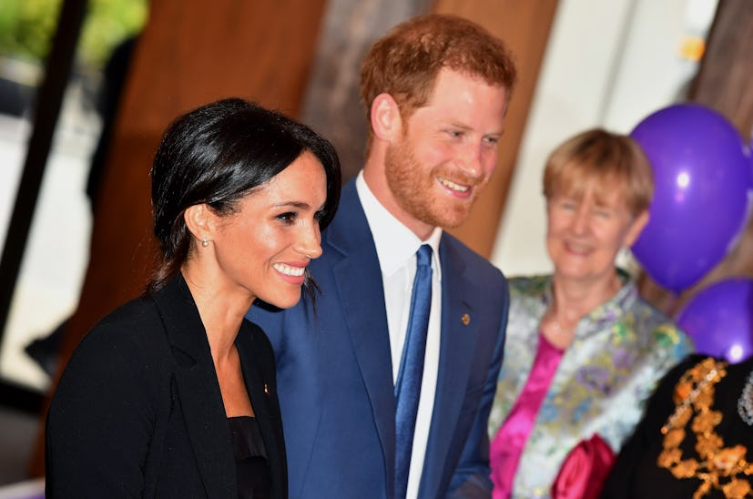 Prince Harry and Meghan Markle at London's WellChild Awards lead