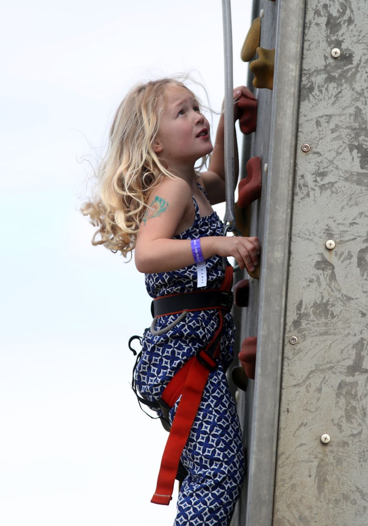 Savannah Phillips rock-climbing at the Royal Windsor Horse Show.
