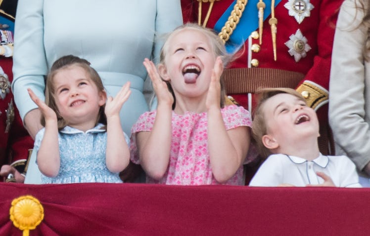 7-year-old princess Charlotte making funny face on the balcony of Buckingham Palace.