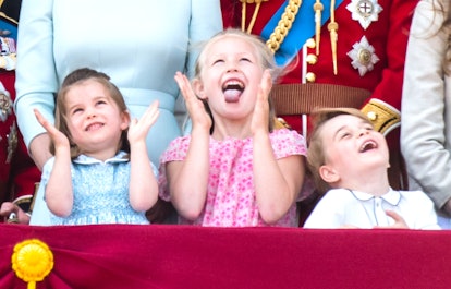 Princess Charlotte and Prince George making a memorable appearance on the Buckingham Palace balcony.