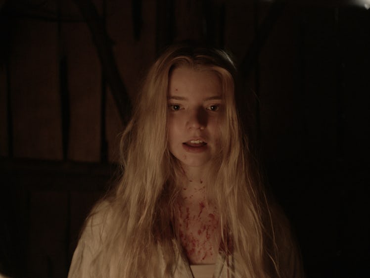 Anya Taylor-Joy covered in blood in the movie 'The Witch'