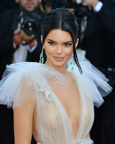 Kendall opts for a slicked-back hairstyle and a natural, nude lip at the 71st annual Cannes Film Fes...