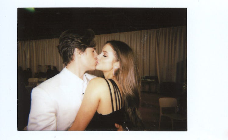 Barbara Palvin and Dylan Sprouse kissing backstage after the 2018 VSFS show 