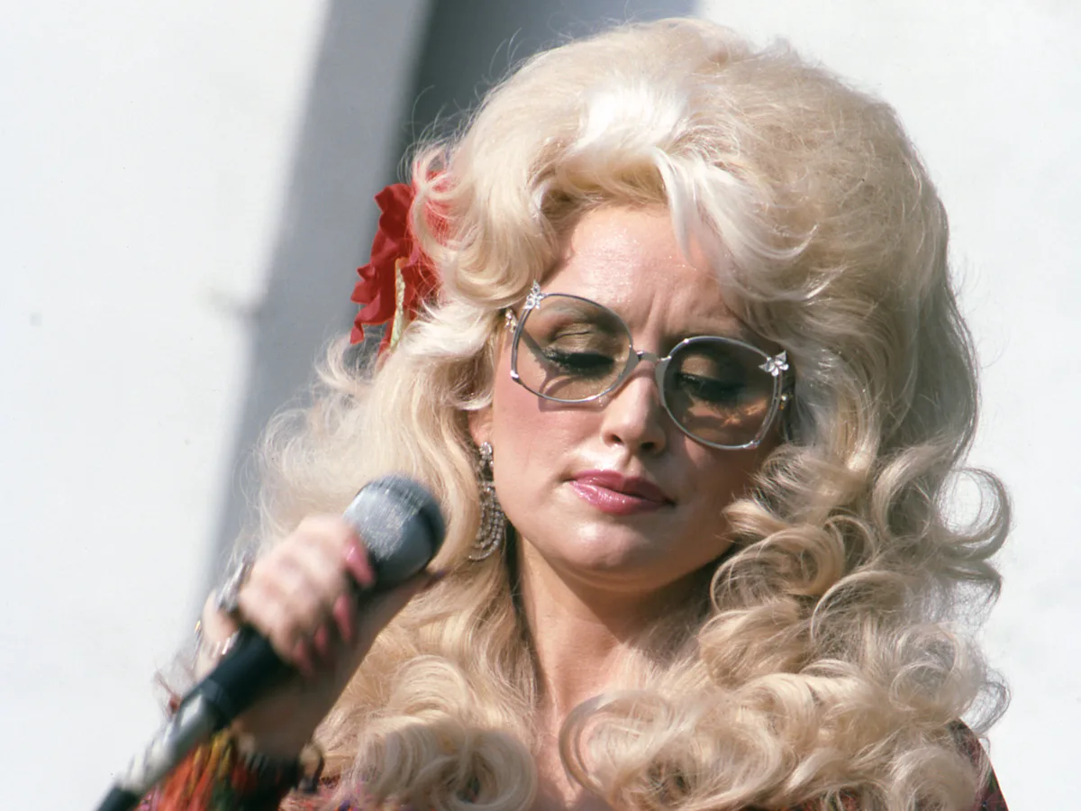 A Visual History of Dolly Parton's Boldest Bedazzled Looks