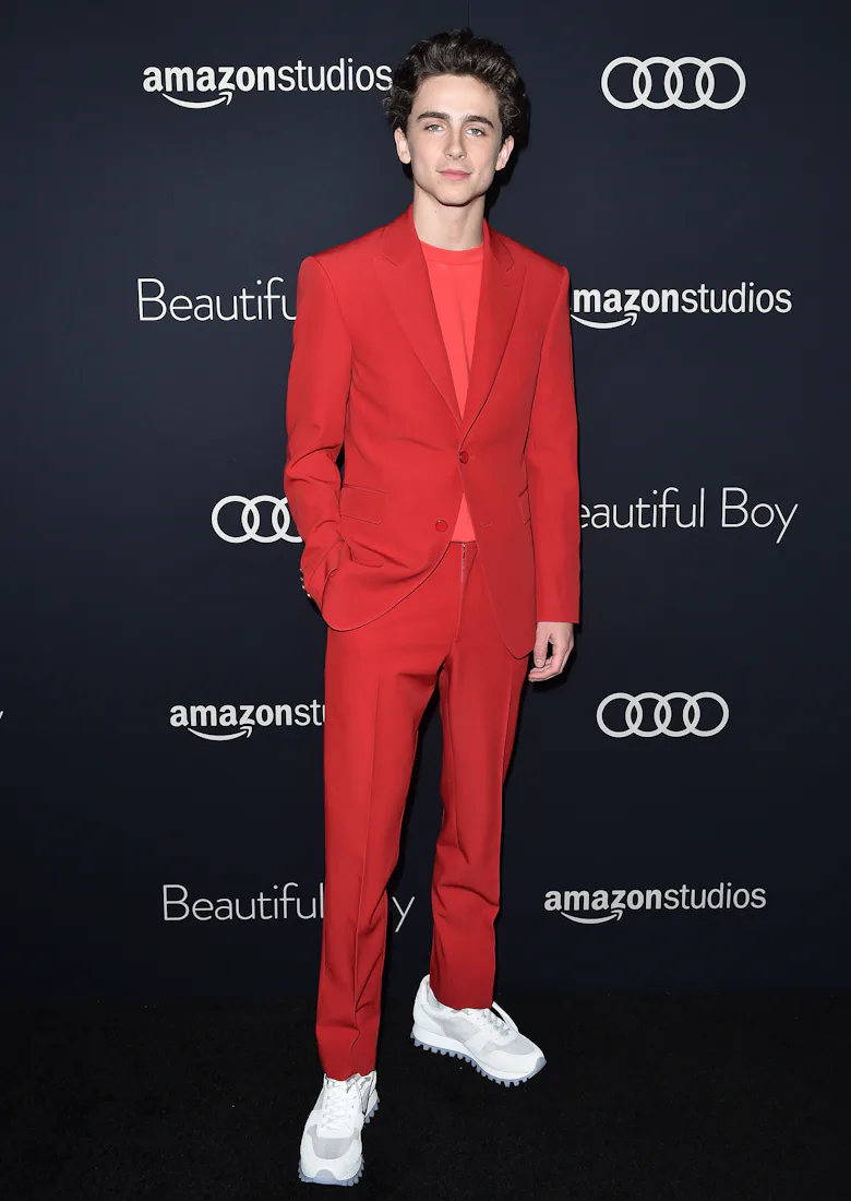 chalamet red dress A moment for Timothe Chalamet's halter top at the #VeniceFilmFestival. The star arrived to the #BonesandAll screening in a custom blood red look from his friend Haider Ackermann. More at the link