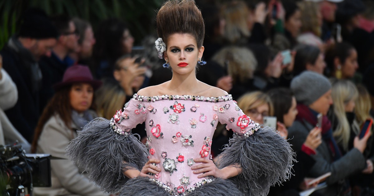 Kaia Gerber Sports Teased Hair and a Feathered Peplum at Chanel's Spring/Summer  2019 Couture Show