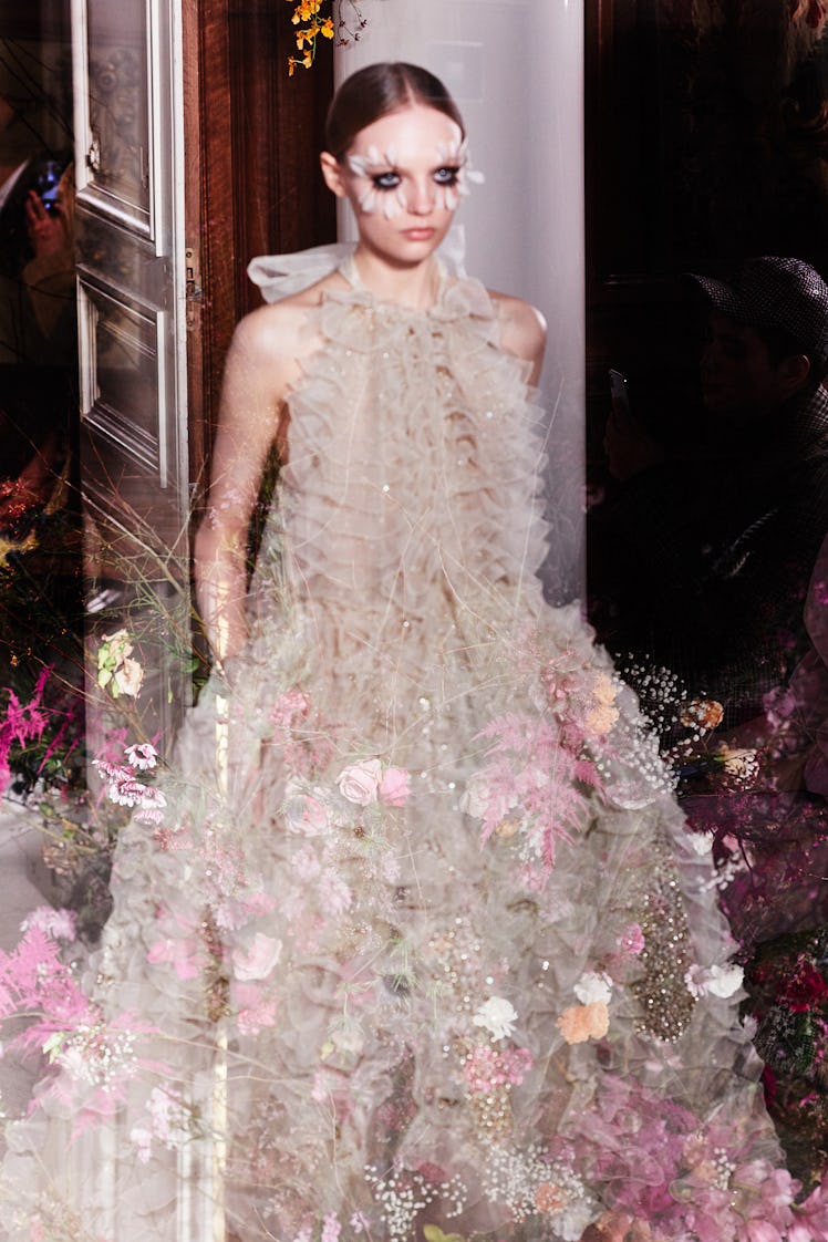 A model in a beige tulle gown during Valentino Haute Couture show in Paris