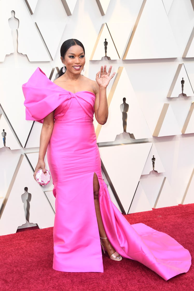 Angela Bassett wearing a pink satin gown at the 2019 Oscars Red carpet 