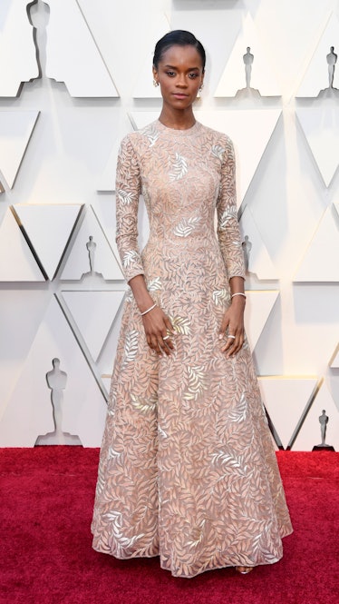 Letitia Wright wearing Dior Haute Couture while attending the 2019 Oscars red carpet