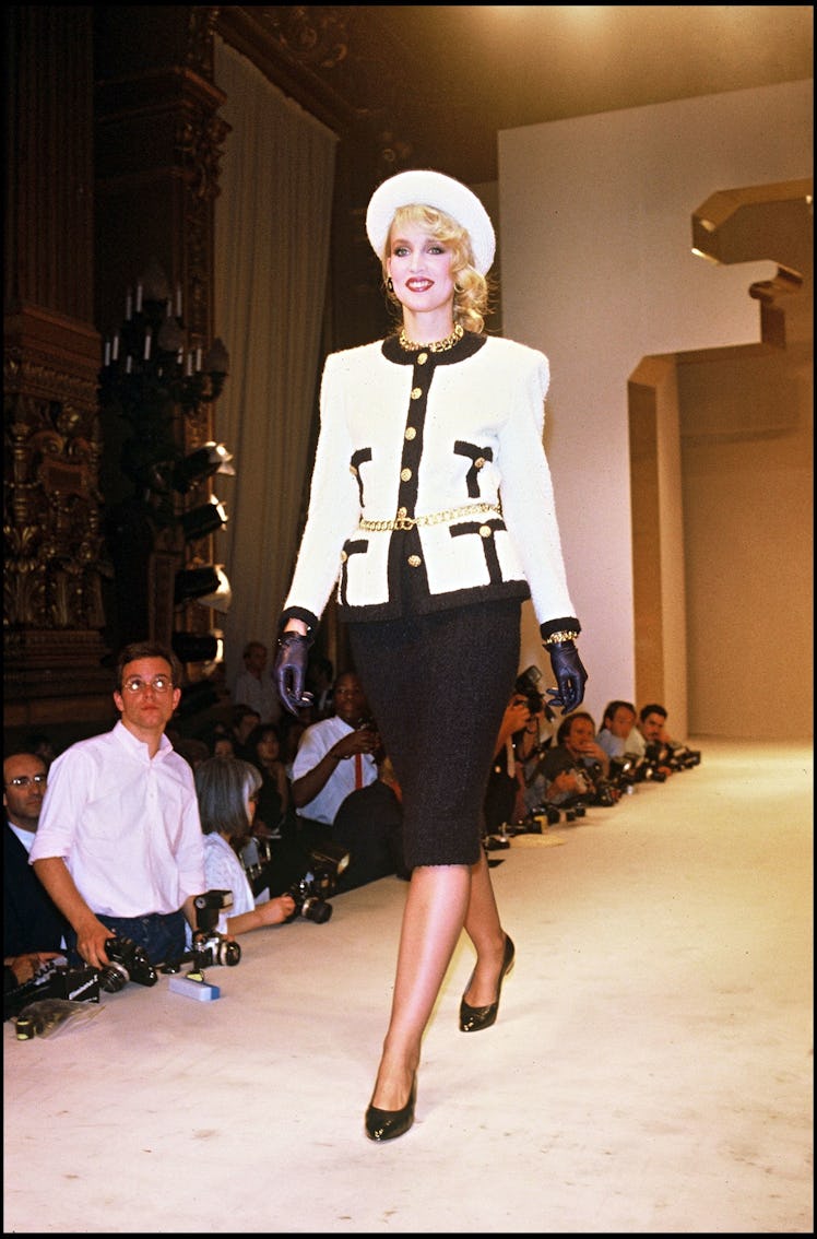 Jerry Hall walking the runway during the Chanel Fall-Winter 1985-1986 fashion show.