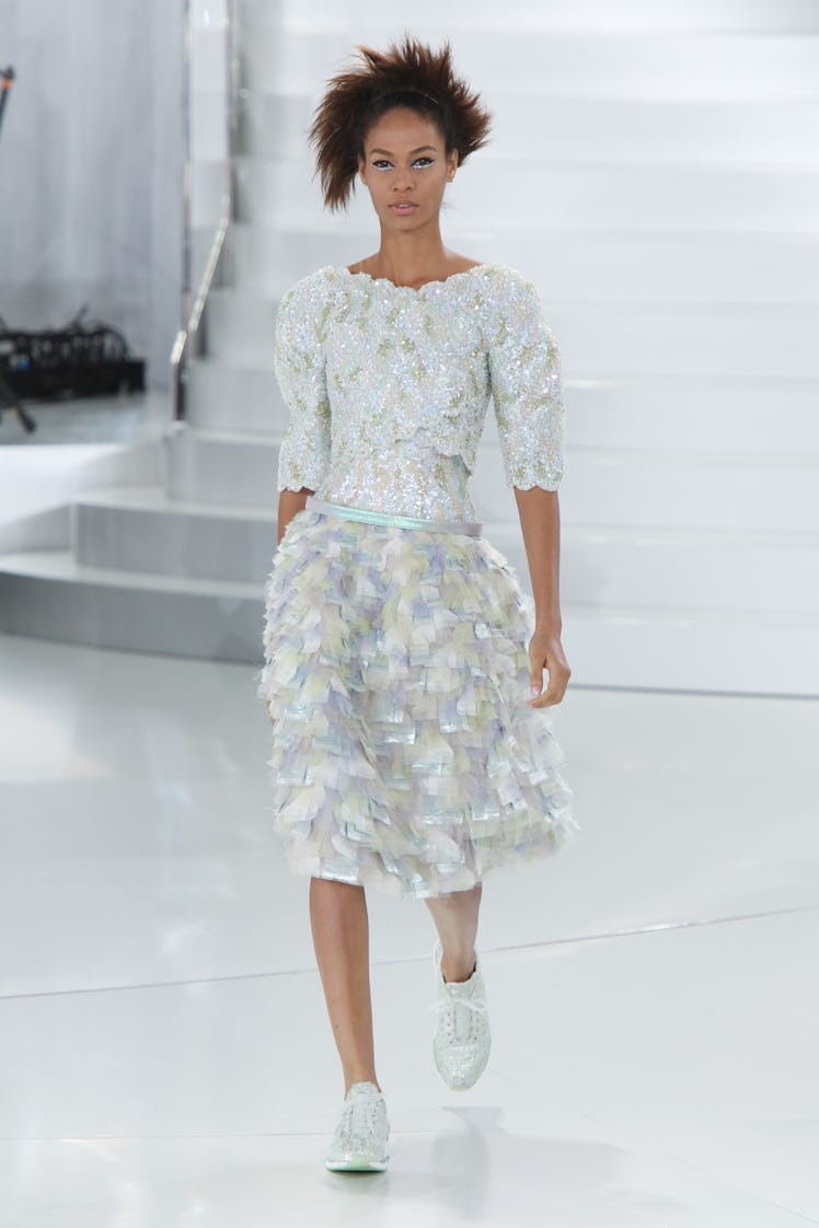 Joan Smalls walking the runway during the Chanel Haute-Couture Spring-Summer 2014 fashion show.