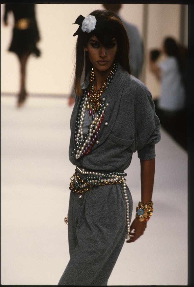 Susan Holmes posing on the runway during the Chanel Ready-to-Wear Fall-Winter 1991-1992 fashion show...