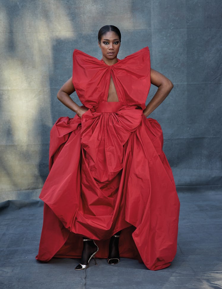 Tiffany Haddish wears a Valentino Haute Couture gown and sandals; Falke tights. Beauty: Nars All Day...