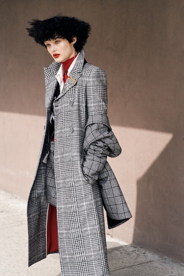 Tibi blazer and skirt; Fendi coat and shirt; Thom Browne vest; Tees by Tina turtleneck. Beauty note:...