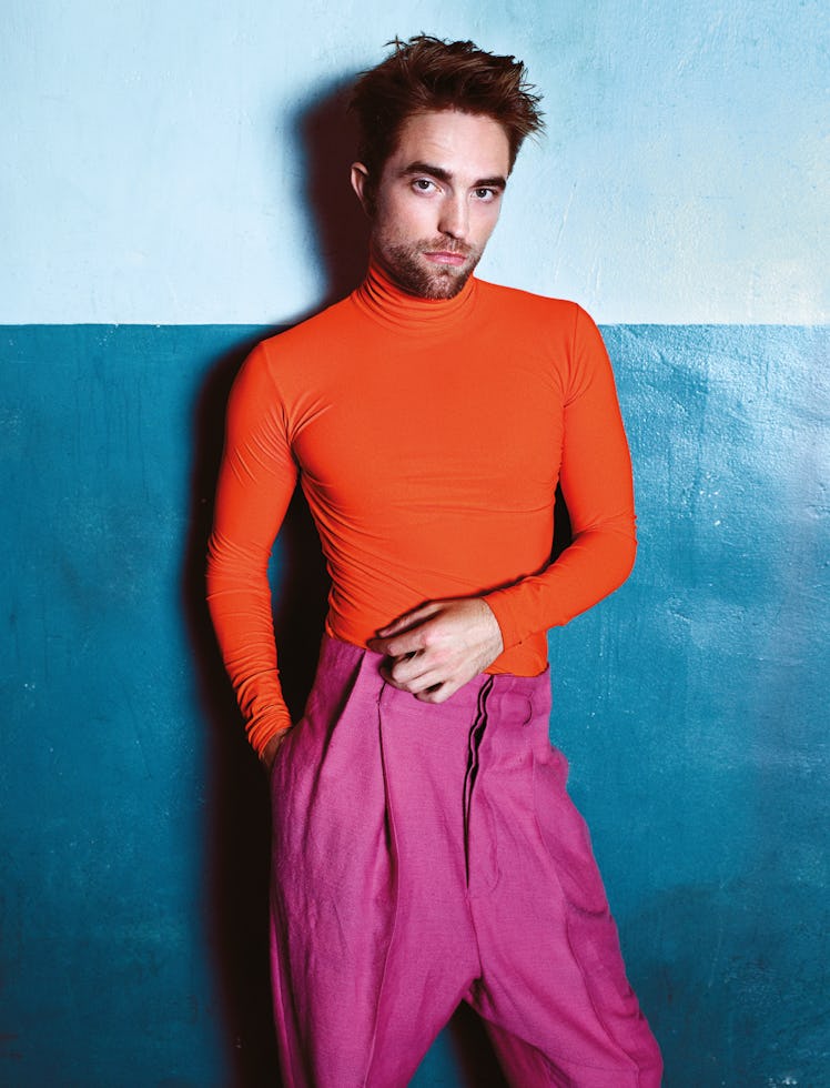Robert Pattinson wears Dior Homme turtleneck; Haider Ackermann pants.