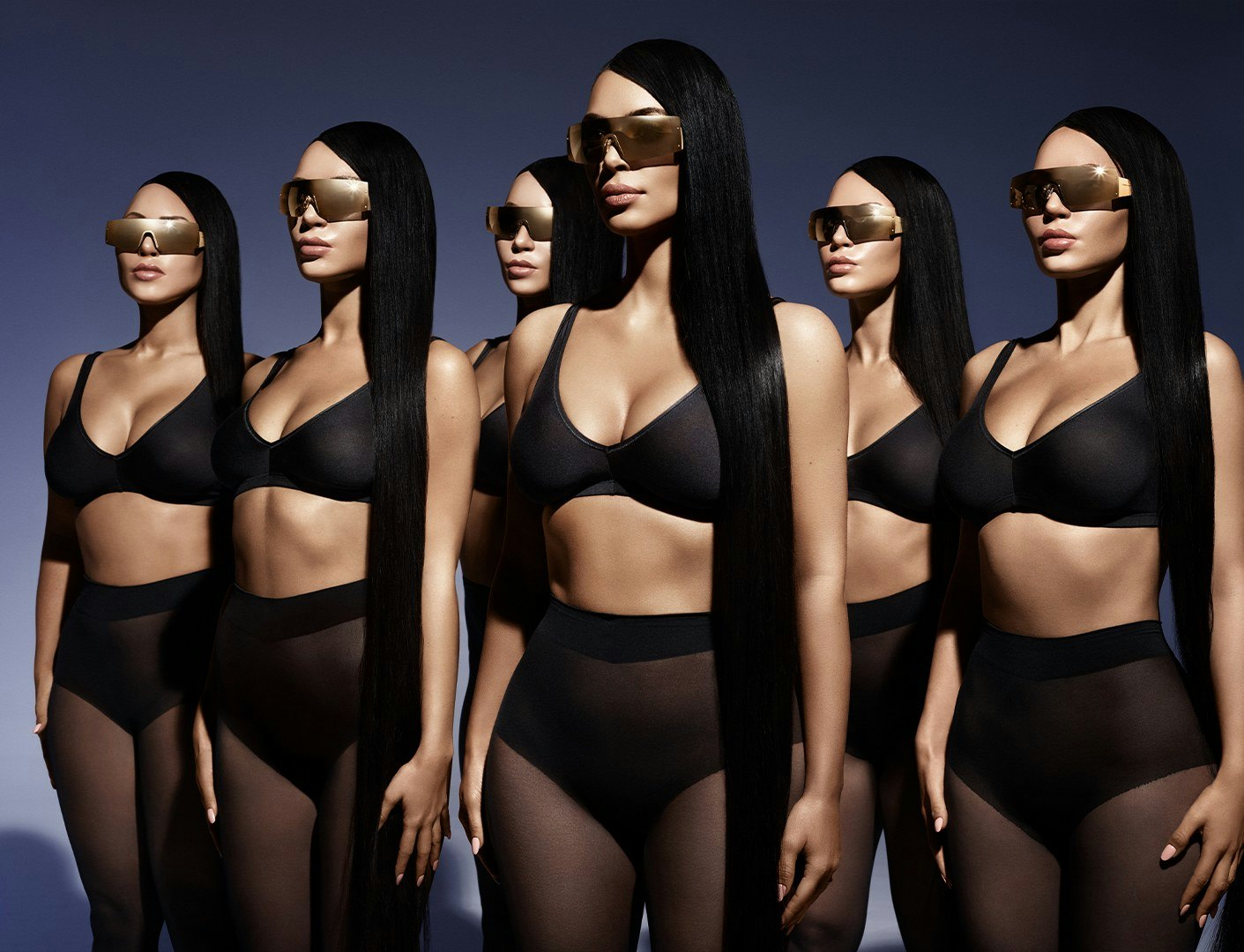 Kim Kardashian turns up the heat while modeling neon swimwear from SKIMS