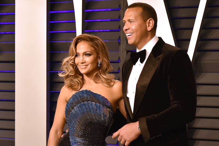 J.Lo and A-Rod posing for a photo during Vanity Fair Oscar Party 2019