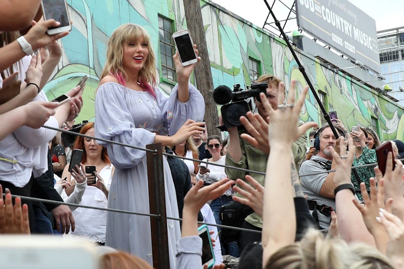 Taylor Swift Surprises Fans At New Kelsey Montague "What Lifts You Up" Mural In Nashville