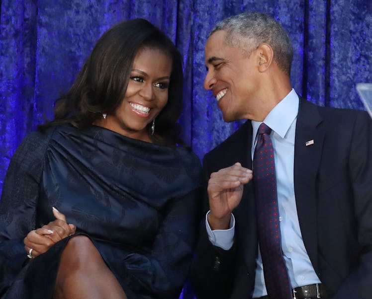 Michelle and Barack Obama smiling