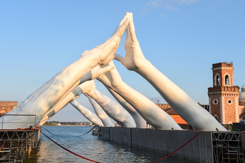 Inauguration Of Lorenzo Quinn's Building Bridges Sculpture During Venice Biennale 2019