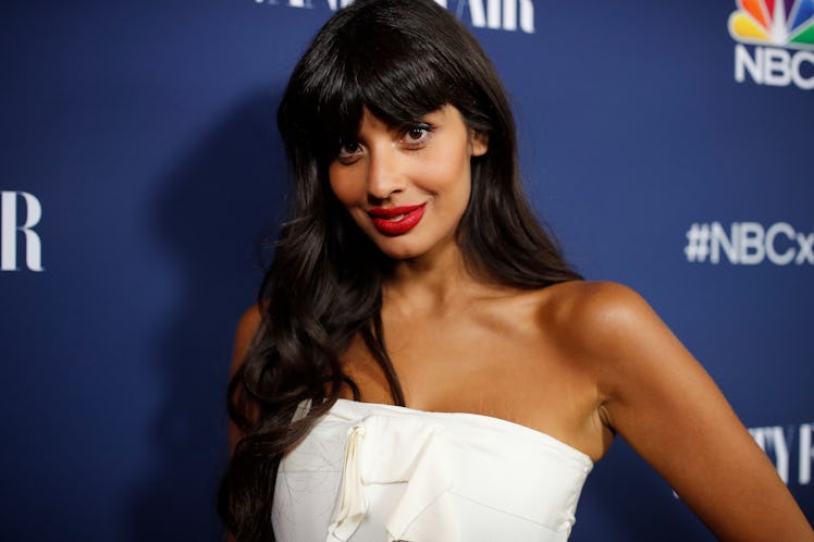 Jameela Jamil wearing a strapless white top
