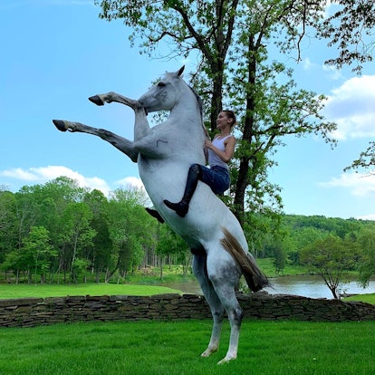 Bella Hadid on a horse 