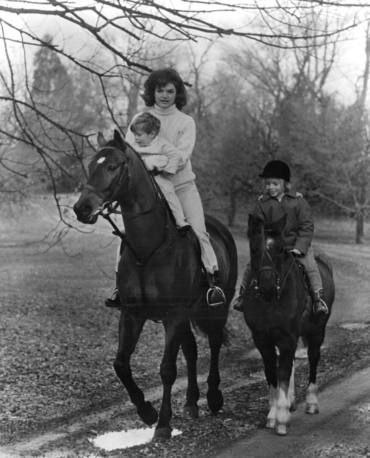 Jackie Kennedy riding horses with her family