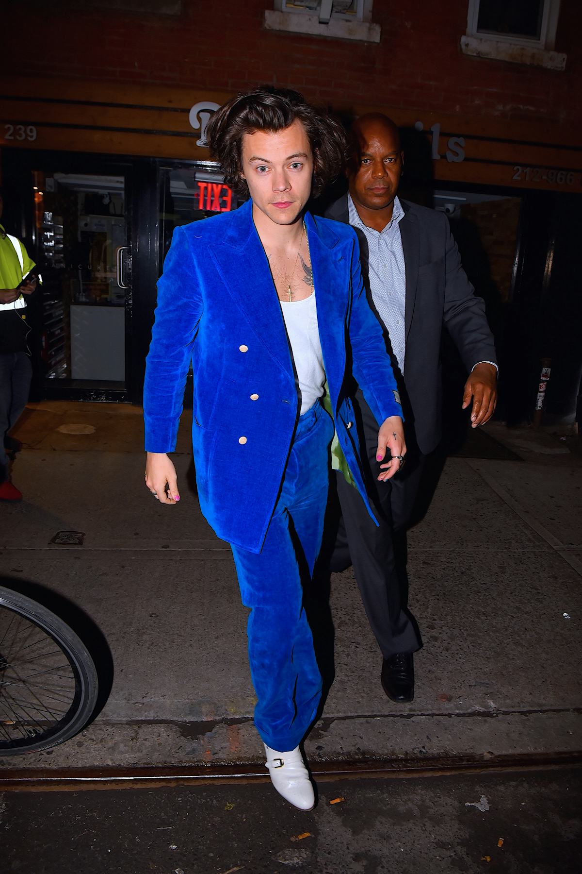 Harry Styles Wears Tiny Tank Top And Clutch Reduces Rome To Tears