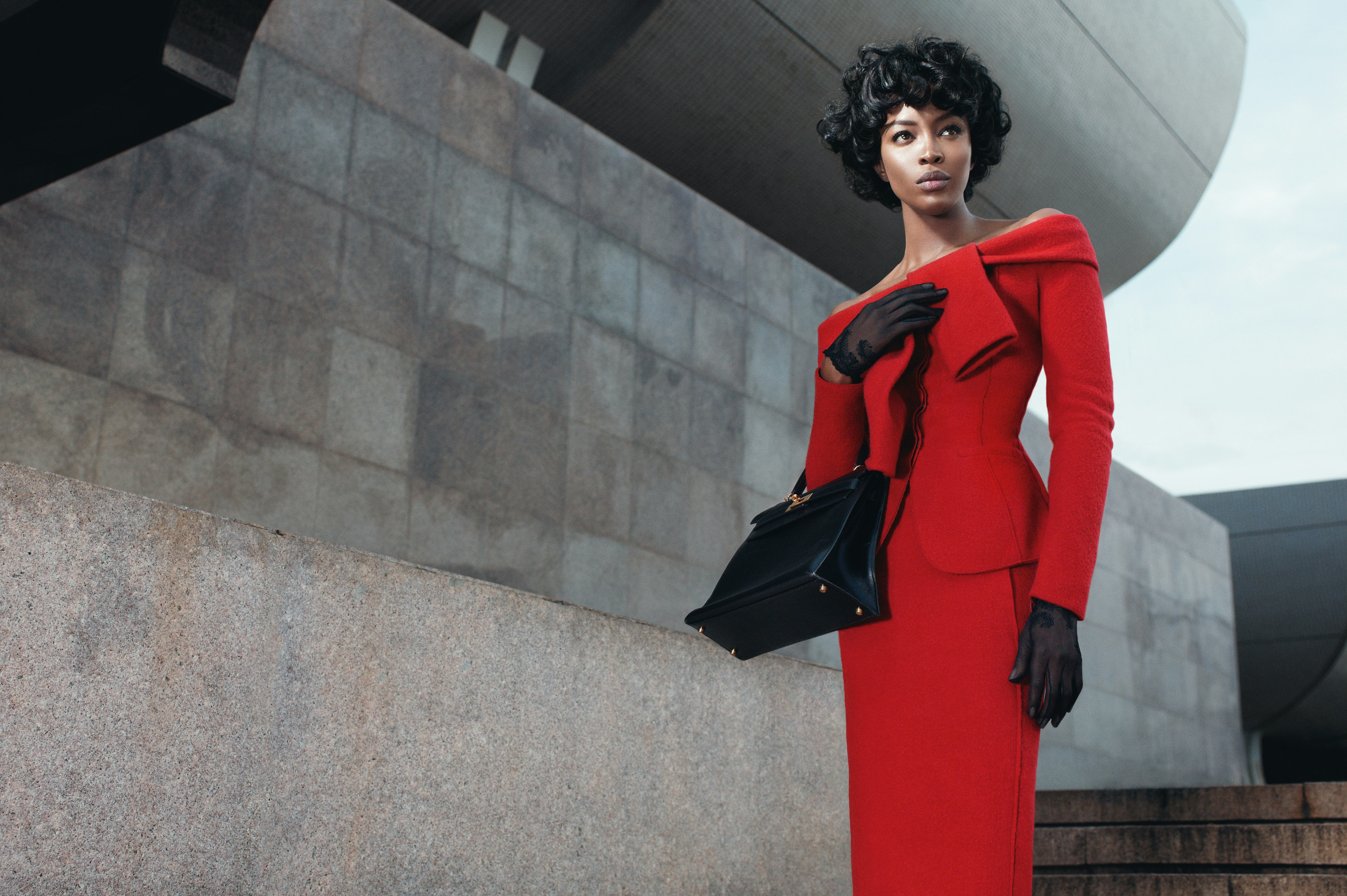 Nina Ricci jacket and skirt; Cornelia James gloves (throughout); Hermès bag.