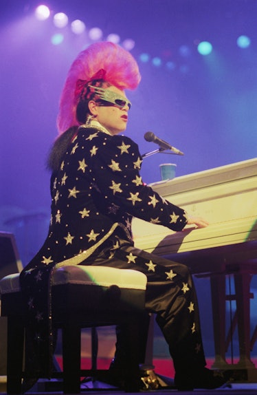 Elton John Performs with Mohawk Hairdo