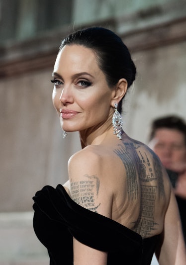Angelina Jolie looking over her shoulder