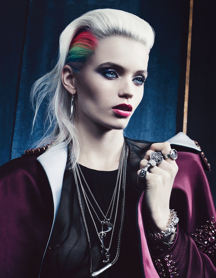 Prada's gabardine coat and chiffon top. Shaun Leane silver earrings; David Yurman sterling silver an...