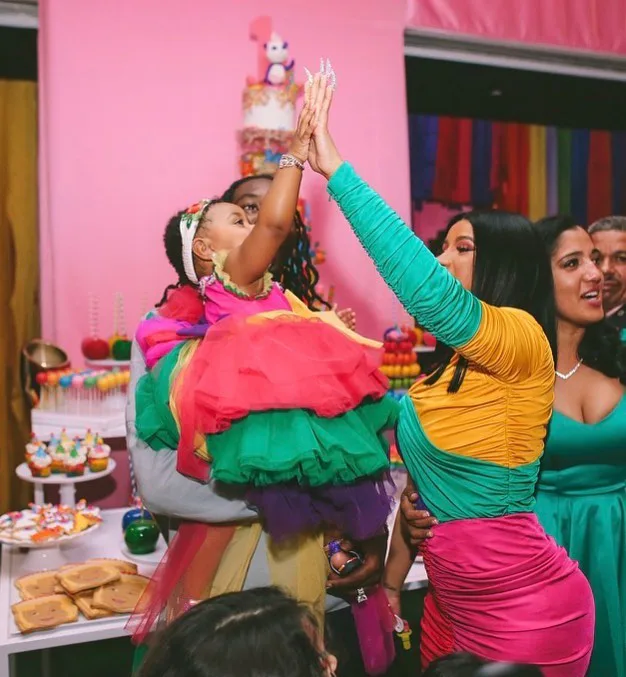 Cardi B And Kulture Matched In Moschino image