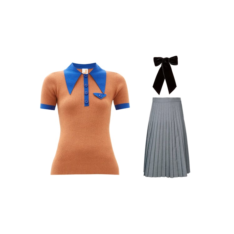 Joostricot orange shirt, Thom Browne grey skirt, and a Jennifer Behr black barrette