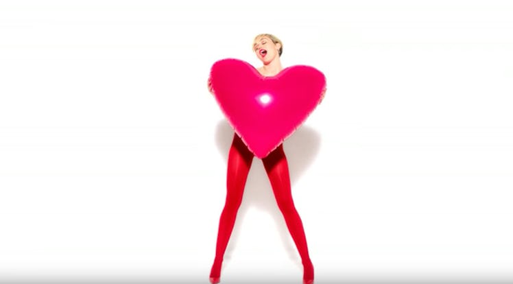 miley-cyrus-golden-lady-red-tights.jpg