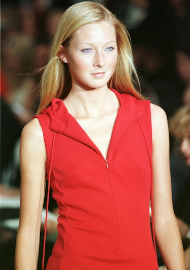 Model In A Red Hooded Top Walks The Runway At The Nicole Miller Fall/Winter 1999 Fashion Show In N